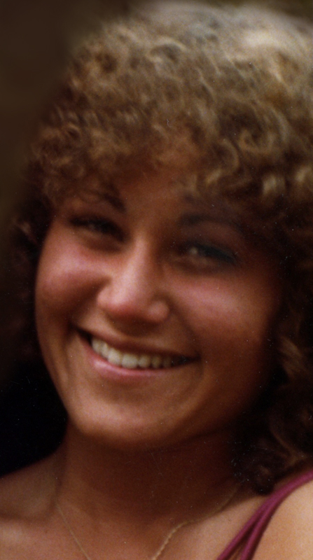 Cheryl smiling up close