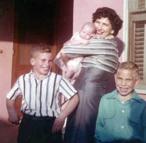 Judy with her mom and brothers