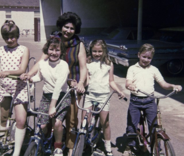 I don't remember these other neighborhood kids in the picture. Now my parking space is right behind my mother.
