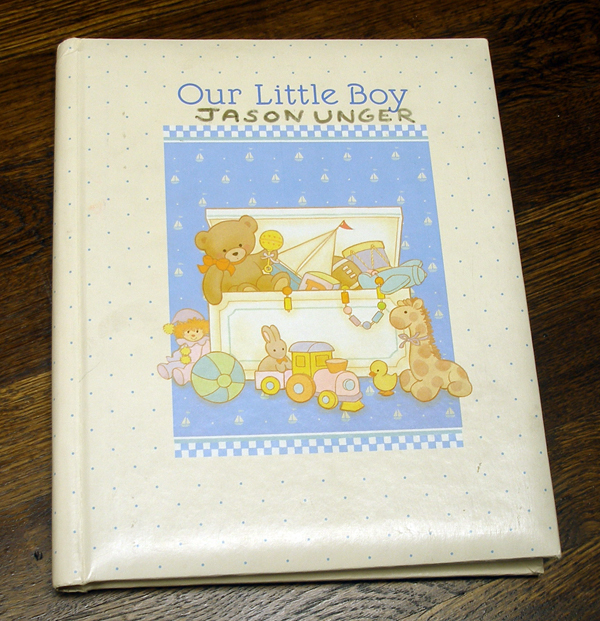 My first-born son’s baby book.