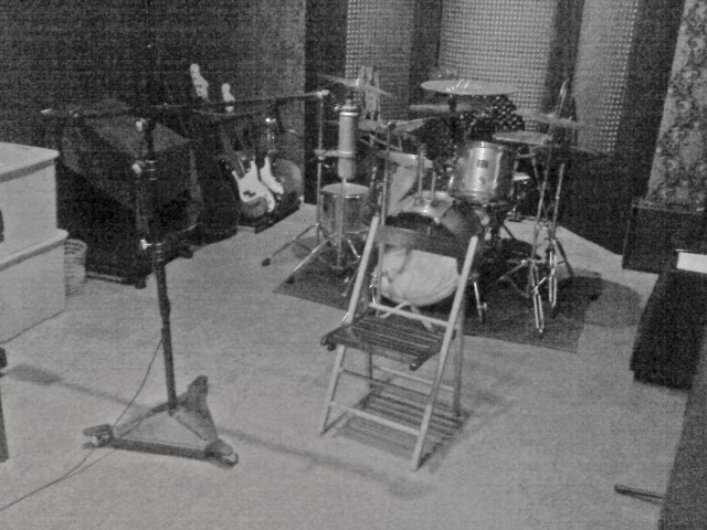 A quick photo taken with my cell phone, I sit in that chair and sing vocals for my songs.