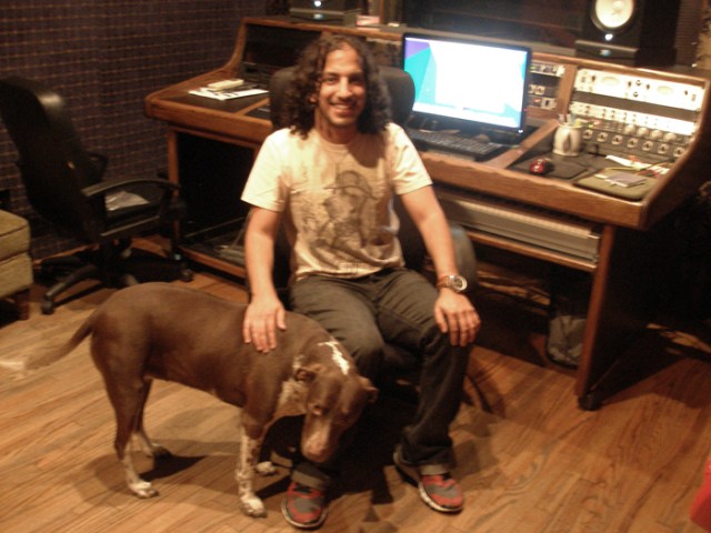 A picture of Darrin at the recording console with his dog nearby. She's never in the room when we record, though.