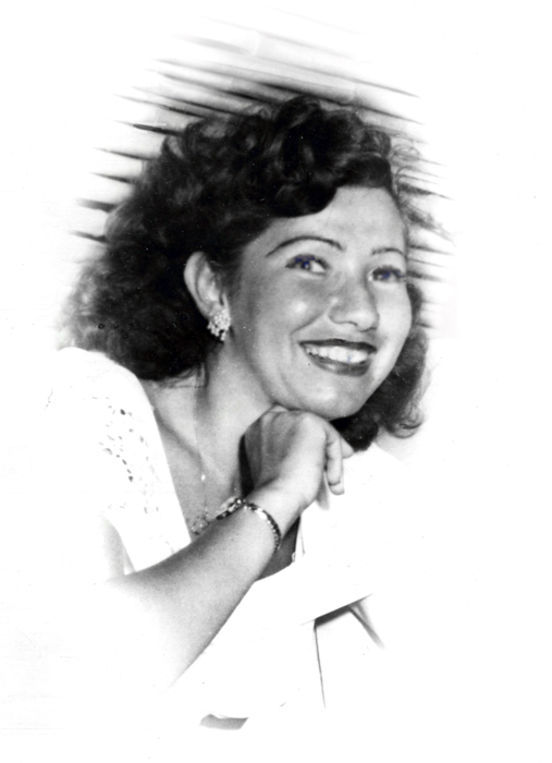 This picture is of my mother when she was young. It looks a little strange due to a photographer’s poor retouching. But my mother still looks very beautiful.