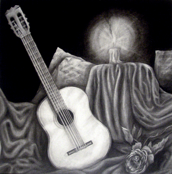This is a charcoal drawing from my college days. I played classical guitar back then.