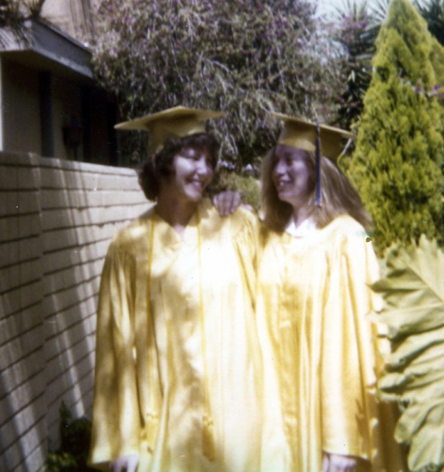 This picture of Joni and I on our high school graduation day was taken on the same walkway outside the coop where I now live.