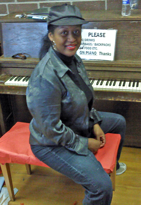 Peaches on piano bench