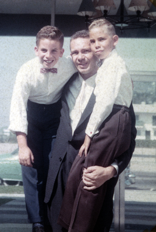 Dad, Norm & How at glass door