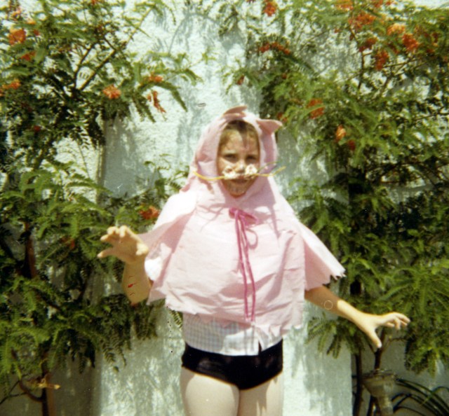 In this picture, I am haunted with memories of Halloween from long ago. I think I’m supposed to be a mouse or a cat. Currently, I have another mouse loose in my apartment, so that’s ironic. 