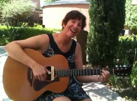 Playing my guitar in the garden