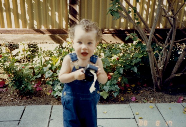 This picture was taken when Jason was about 3 and visiting his grandparents. I am living in my parents’ coop now. I am a song gardener only, which will be clear in the picture that follows showing the current state of my backyard!
