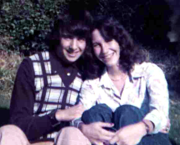 Judy & Sam in front of apt