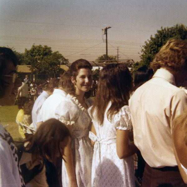   In this picture, I’m graduating from Middle School and am about fifteen years old.