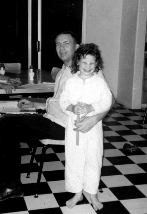Seeing pictures of myself in the apartment where I’m now living is like time travel. This year, I replaced the black and white floor and love the new look. I’m wondering why I have such a scrunched up expression in this picture with my dad.