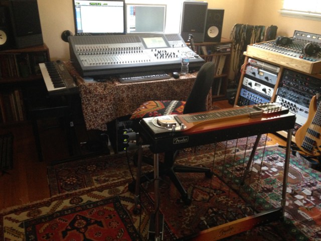 This is where I’ve been doing some new guitar recordings, as well as stories for an audio book. My engineer sits at the mixing board near the window when I am recording. Sometimes, the birds are chirping too loudly and he goes outside to shoo them away.